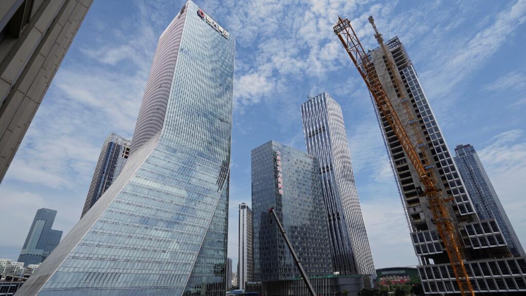 Hong Kong stock exchange suspends trades of debt-ridden Evergrande